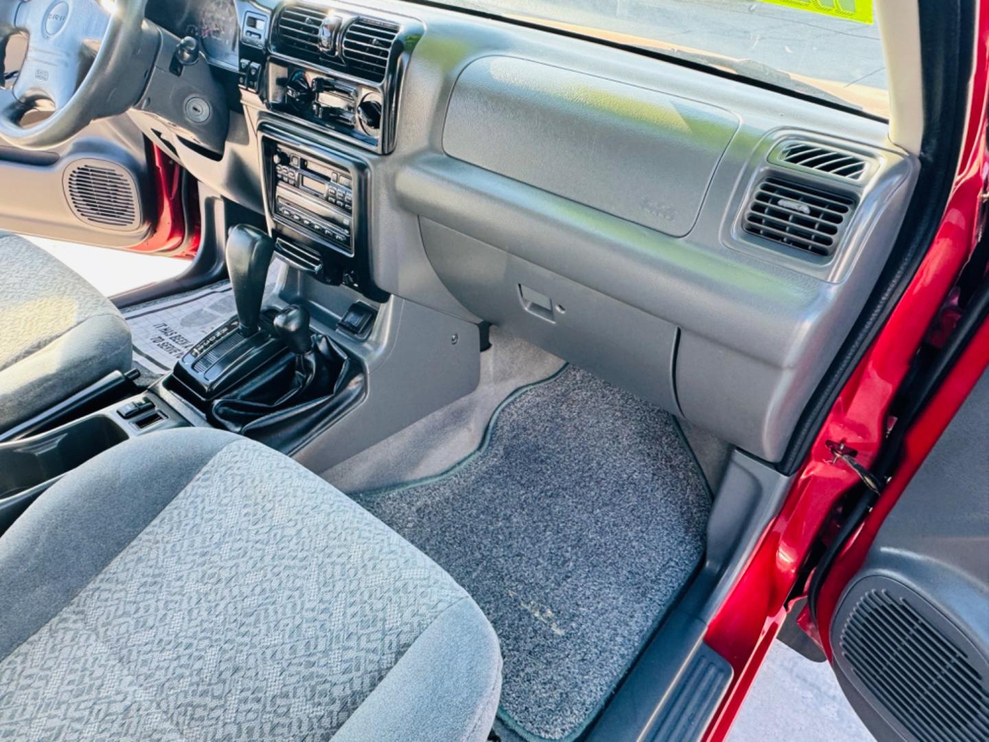 2000 Red Isuzu Rodeo LS , located at 2190 Hwy 95, Bullhead City, AZ, 86442, (928) 704-0060, 0.000000, 0.000000 - 2000 Isuzu rodeo LS. Automatic 4 wheel drive . Only 114k original miles v6. Brand new tires . Lots of upgrades . We finance - Photo#7